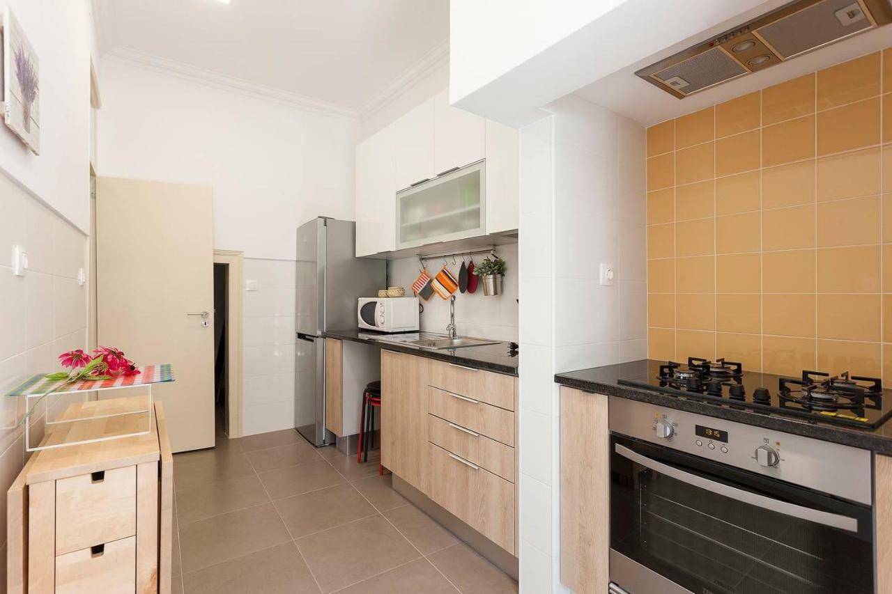Sunny orange garden apartment in central Lissabon Buitenkant foto