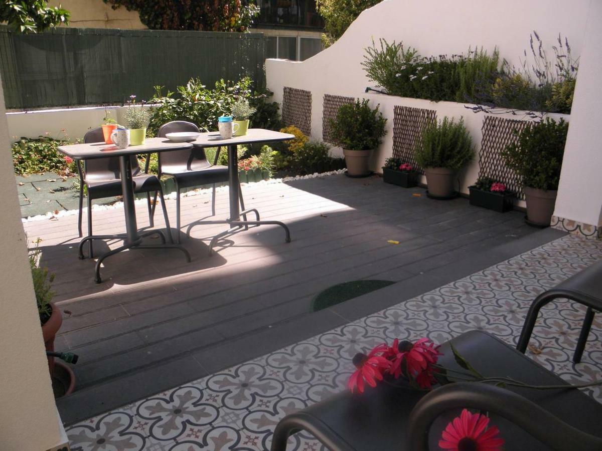 Sunny orange garden apartment in central Lissabon Buitenkant foto