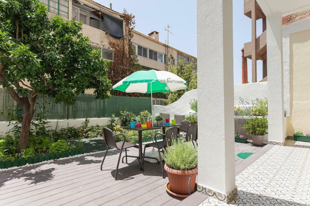 Sunny orange garden apartment in central Lissabon Buitenkant foto