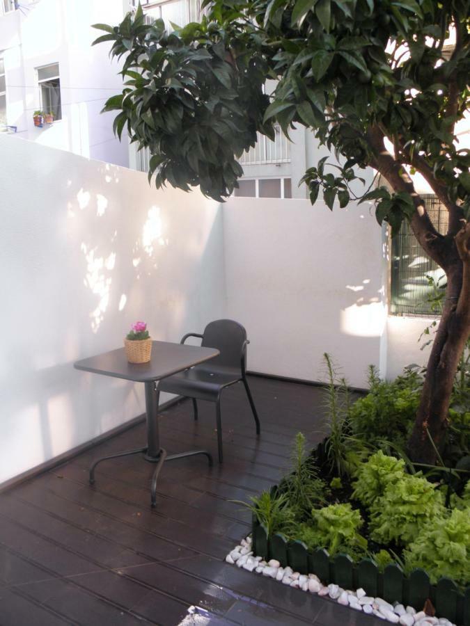 Sunny orange garden apartment in central Lissabon Buitenkant foto